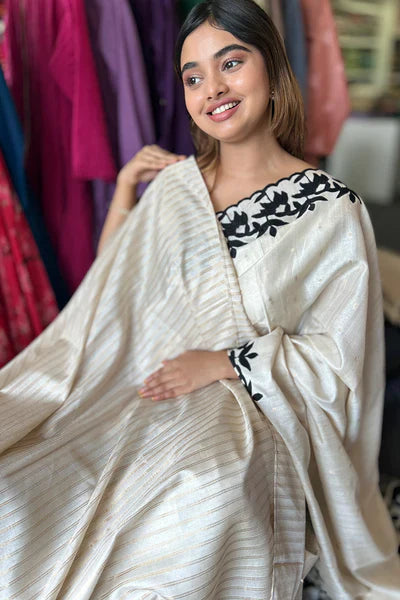 Semi Tussar saree with Deep black applique