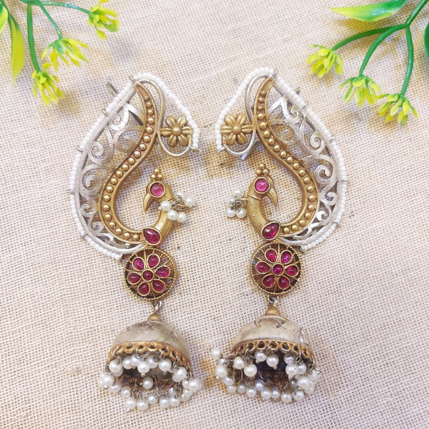 Sajni  Silver Look Alike Dual Tone Peacock Earrings