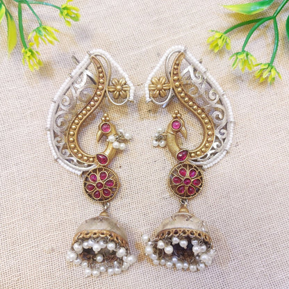 Sajni  Silver Look Alike Dual Tone Peacock Earrings