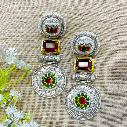 silver earrings with green stone