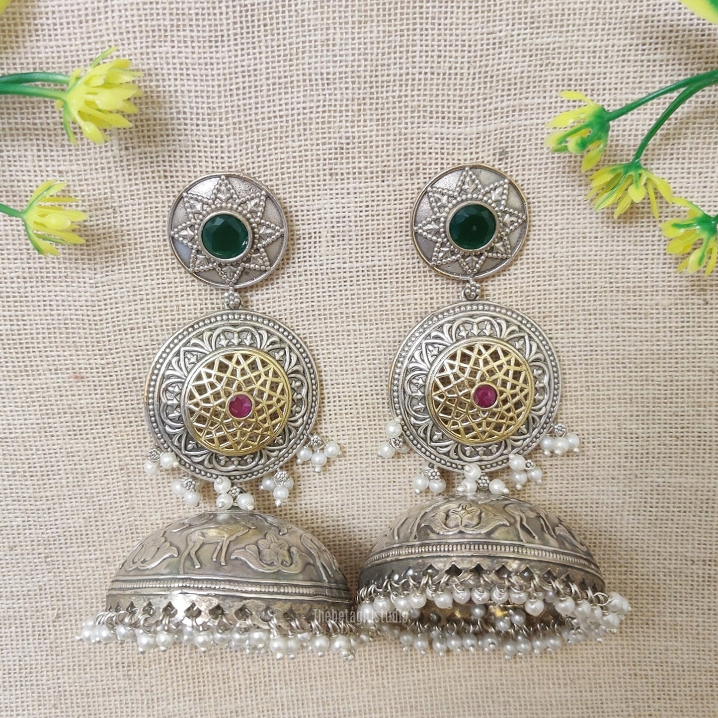 dual tone jhumka earrings