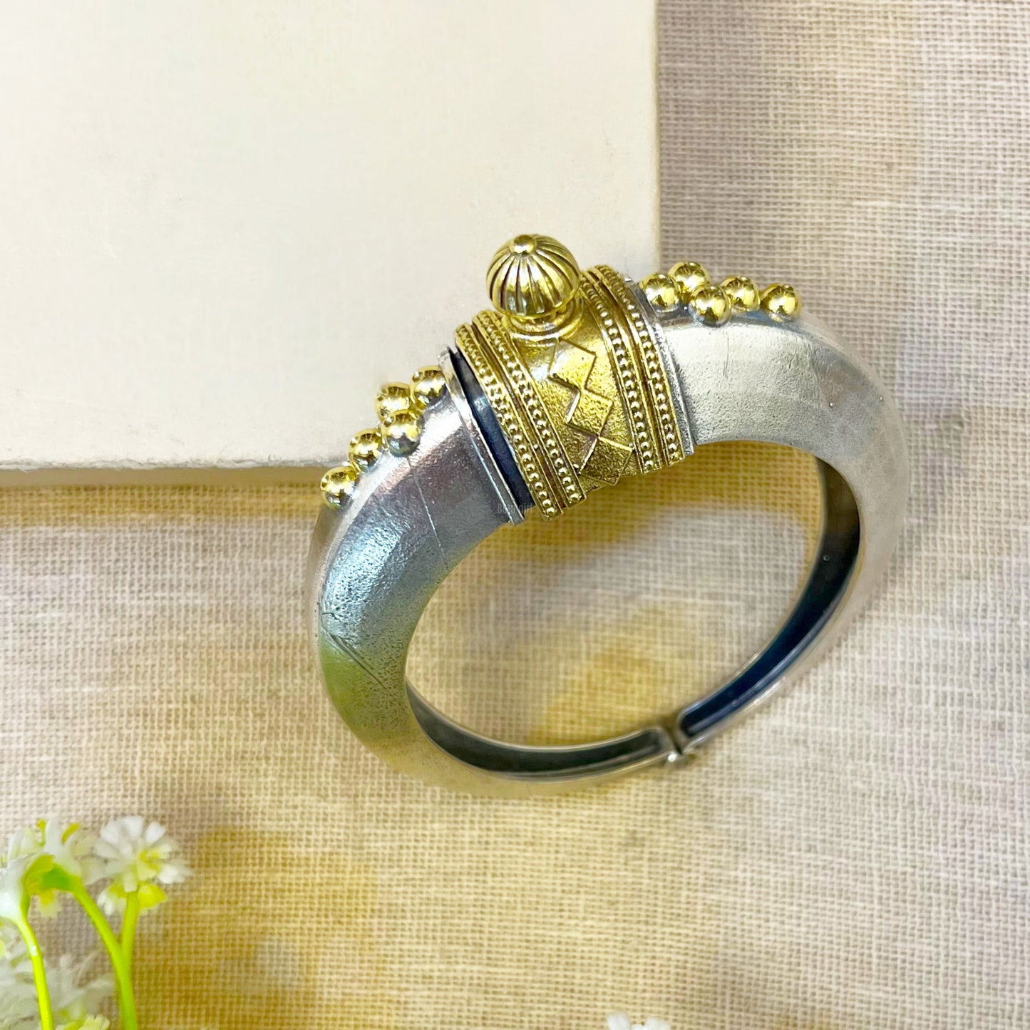 Silver and gold ring